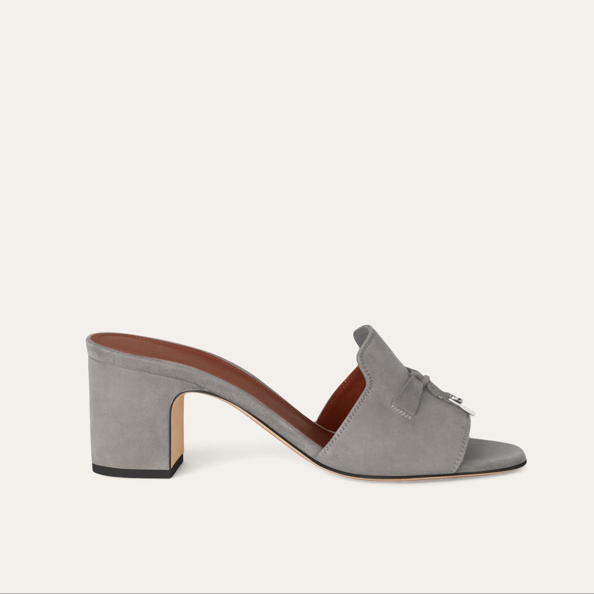 Gray sandal with a small bow on a white background